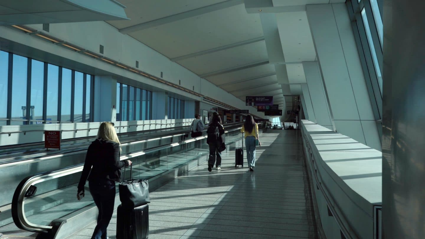 Travellers in an international airport terminal